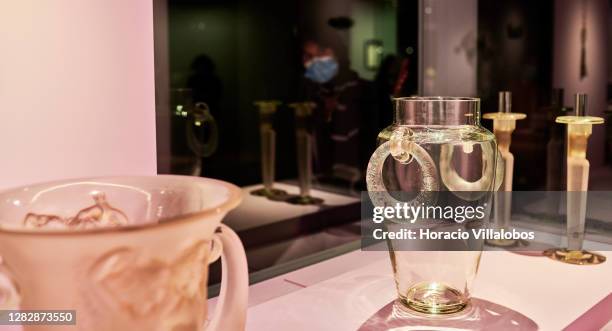 Glass works of art on display at the "René Lalique e a Idade do Vidro, Arte e Indústria" during the COVID-19 Coronavirus pandemic on October 29, 2020...