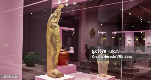 Glass works of art on display at the "René Lalique e a Idade do Vidro, Arte e Indústria" during the COVID-19 Coronavirus pandemic on October 29, 2020...