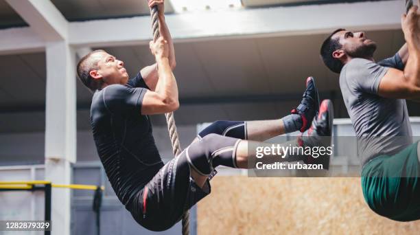 676 Man Pulling Rope Gym Stock Photos, High-Res Pictures, and