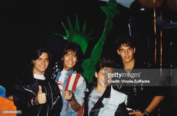 Puerto Rican singer Ricky Martin and current members of Puerto Rican boy band Menudo attend a video party organised by BOP Magazine, held at Club...