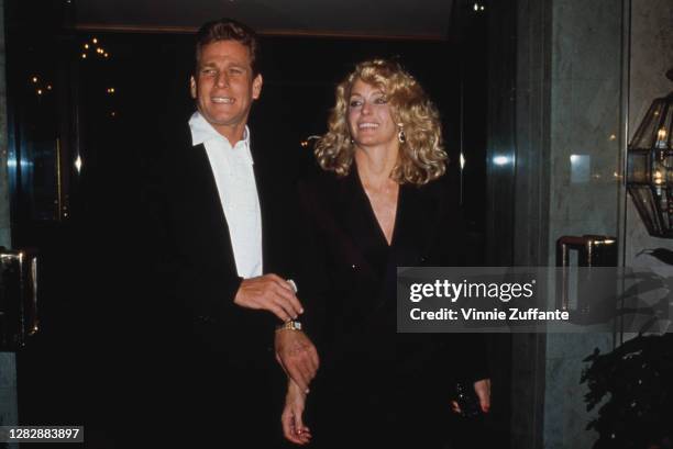 American actor Ryan O'Neal and his wife, actress Farrah Fawcett attend the wedding of Richard Berry, held at La Bel Age Hotel in West Hollywood,...