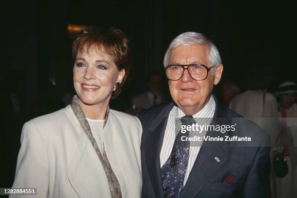 British actress and singer Julie Andrews and American film director Robert Wise attend the 17th Women In Film Crystal Awards Luncheon, held at the...