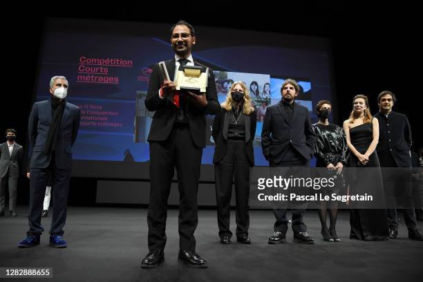 Short film Palme d'Or winner Sameh Alaa is seen on stage in front of the jury members Rachid Bouchareb, Claire Burger, Damien Bonnard, Dea...
