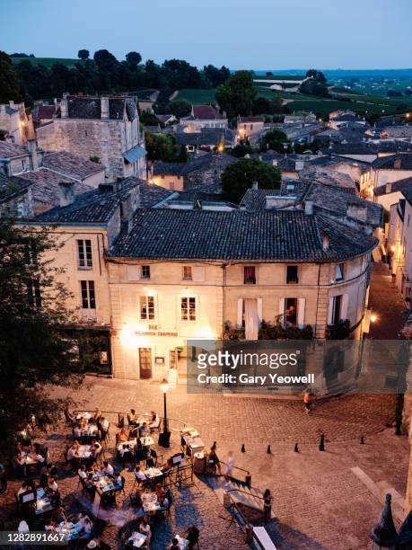 elevated view over the rooftops of saint-emilion. - bordeaux square stock pictures, royalty-free photos & images