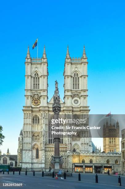 westminster abbey facade at early dusk in london, england, uk - westminster abbey london stock pictures, royalty-free photos & images