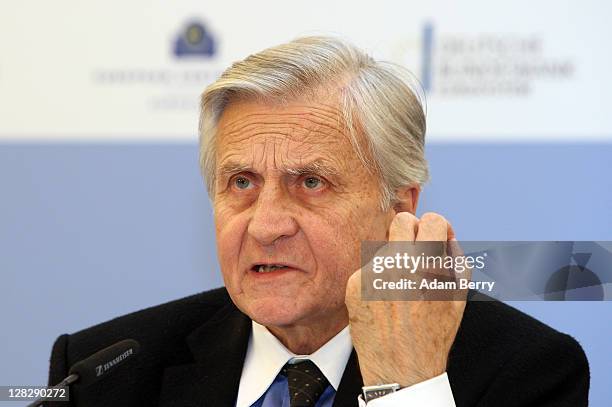 Jean-Claude Trichet, president of the European Central Bank, answers a journalist's question at a press conference following a meeting of the ECB...