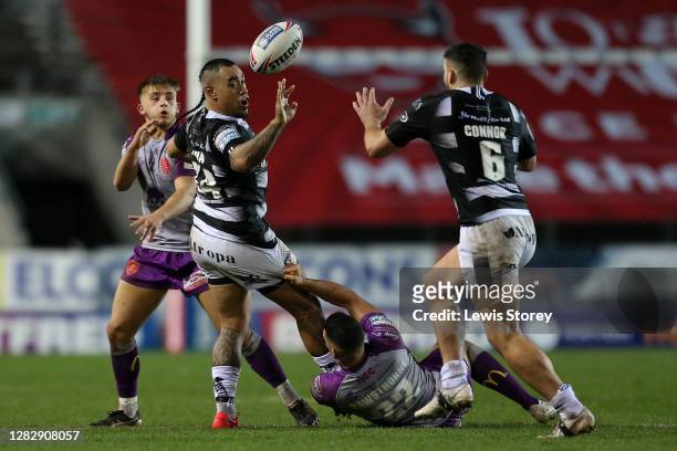 Mahe Fonua of Hull FC drops the ball after being tackled during the Betfred Super League match between Hull Kingston Rovers and Hull FC at Totally...