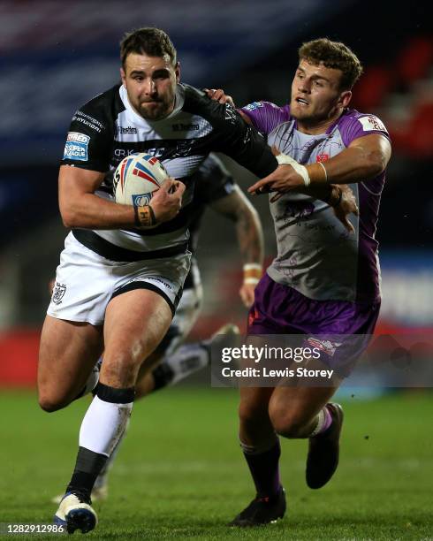 Josh Bowden of Hull FC in action with George Lawler of Hull Kingston Rovers during the Betfred Super League match between Hull Kingston Rovers and...