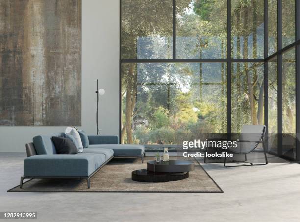 soggiorno moderno con vista sulla foresta - stile minimalista foto e immagini stock