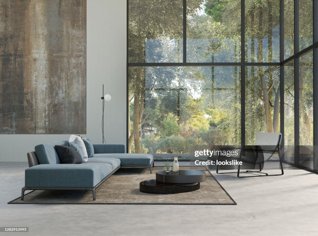 Modern living room with forest view