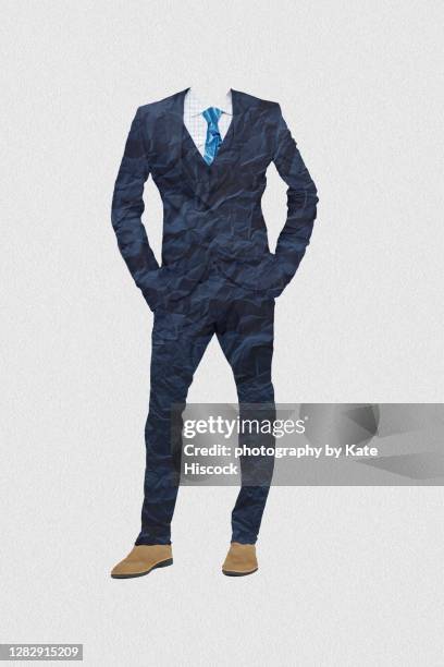 suit made of crumpled paper - pant suit stock pictures, royalty-free photos & images