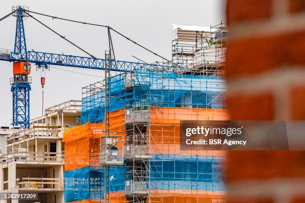 View of a building site on October 28, 2020 in Amsterdam, Netherlands. The Dutch building industry suffered a 3.5% decline in the second quarter of...