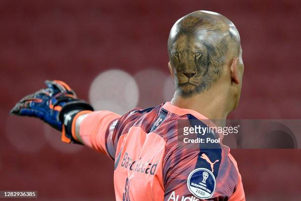 Detail of a lion´s tattoo on the head of Sebastián Sosa goalkeeper of Independiente during a second round match of Copa CONMEBOL Sudamericana 2020...