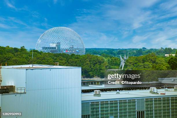 montreal biodome look from the side of the old port in montreal - montreal biodome stock pictures, royalty-free photos & images