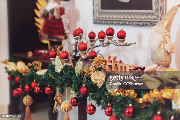 beautifully decorated foyer table during the christmas - heritage hall stock pictures, royalty-free photos & images