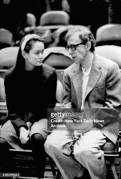 Woody Allen with his adopted daughter Soon-Yi Previn at New York Knicks game.