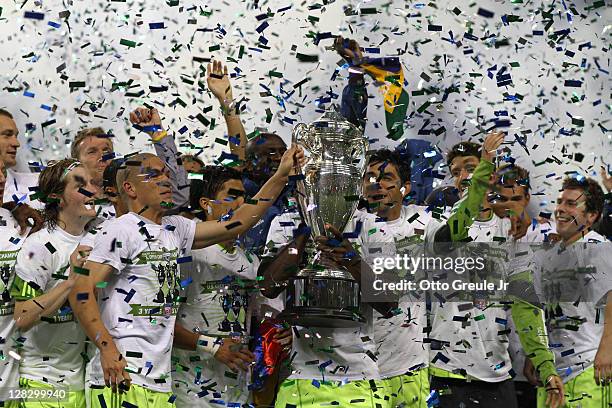 Members of the Seattle Sounders FC pose for a photo after defeating the Chicago Fire 2-0 in the 2011 Lamar Hunt US Open Cup Final at CenturyLink...