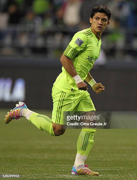 Fredy Montero of the Seattle Sounders FC follows the play against the Chicago Fire during the 2011 Lamar Hunt US Open Cup Final at CenturyLink Field...