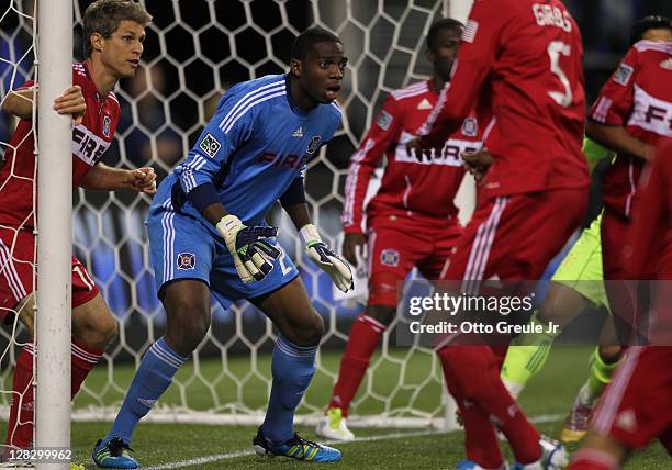 Goalkeeper Sean Johnson of the Chicago Fire defends against the Seattle Sounders FC in the 2011 Lamar Hunt US Open Cup Final at CenturyLink Field on...