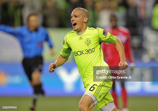 Osvaldo Alonso of the Seattle Sounders FC celebrates after scoring the second goal against the Chicago Fire during the 2011 Lamar Hunt US Open Cup...