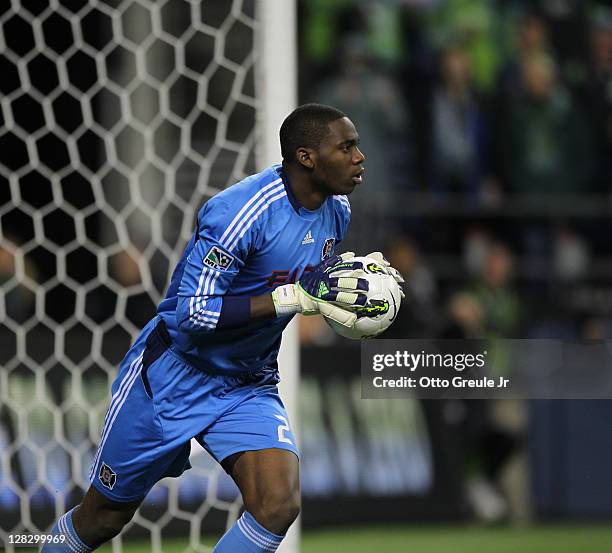 Goalkeeper Sean Johnson of the Chicago Fire defends against the Seattle Sounders FC in the 2011 Lamar Hunt US Open Cup Final at CenturyLink Field on...