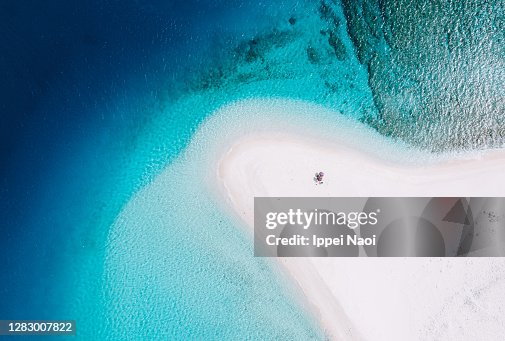 White sandbar with clear blue tropical water from above, Okinawa, Japan White sandbar with clear blue tropical water from above, Okinawa, Japan