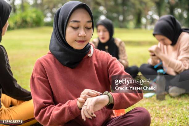 Muslim Girls using Smart Watch