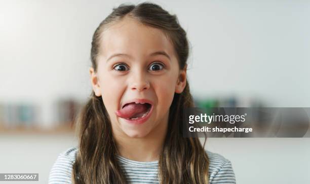 she's always in the mood to play - sticking out tongue stock pictures, royalty-free photos & images