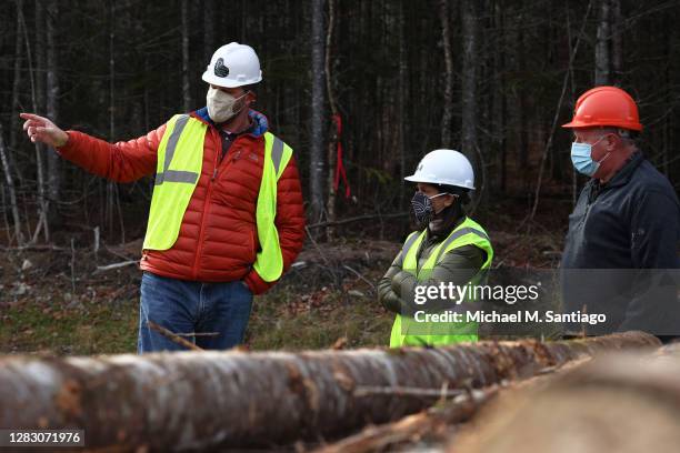 Democratic U.S. Senate candidate Sara Gideon gets a tour of a spruce and fir logging site from Dana Doran, executive director of Professional Logging...