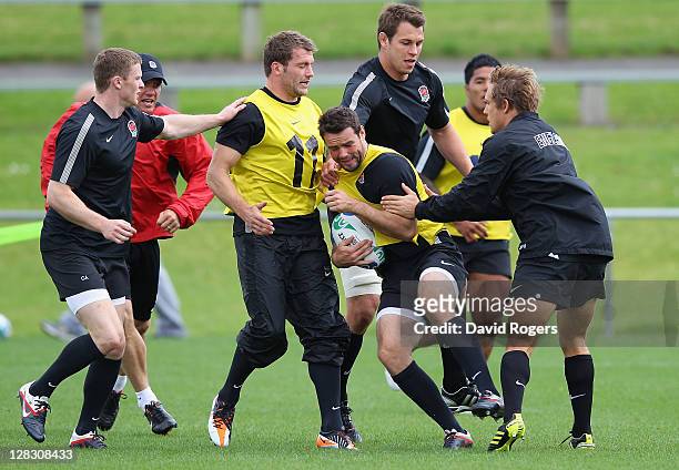 Chris Ashton , Mark Cueto and Jonny Wilkinson of England stop Ben Foden's run with the ball during an England IRB Rugby World Cup 2011 Captain's Run...