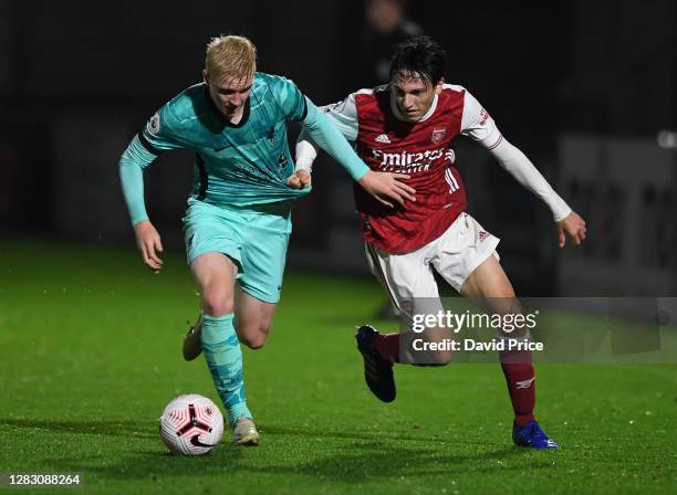 Joel Lopez of Arsenal takes on Luis Longstaff of Liverpool during the Premier League 2 match between Arsenal and Liverpool at Meadow Park on October...