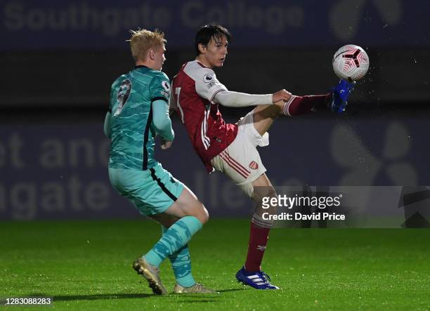 Joel Lopez of Arsenal is closed down by Luis Longstaff of Liverpool during the Premier League 2 match between Arsenal and Liverpool at Meadow Park on...
