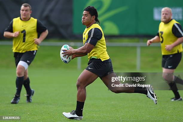 Manu Tuilagi of England runs with the ball during an England IRB Rugby World Cup 2011 Captain's Run at Onewa Domain on October 7, 2011 in Takapuna,...