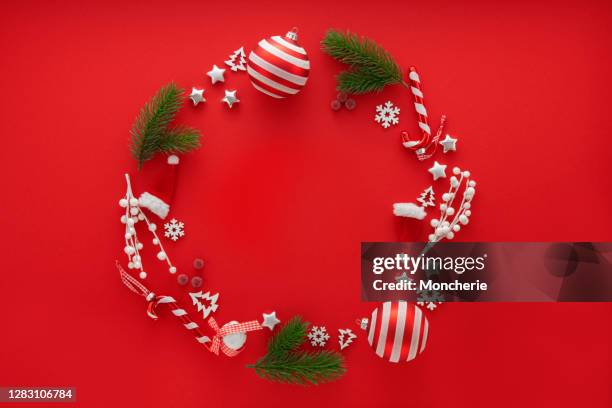 christmas decoration on red background with copy space - tree white background stock pictures, royalty-free photos & images