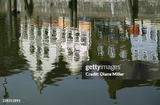Reflection of waterfront buildings, Husum, Germany Reflection of waterfront buildings, Husum, Germany