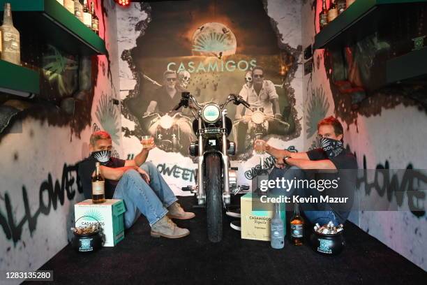 George Clooney and Rande Gerber prepare Casamigos Halloween Comes to You in Los Angeles, California.