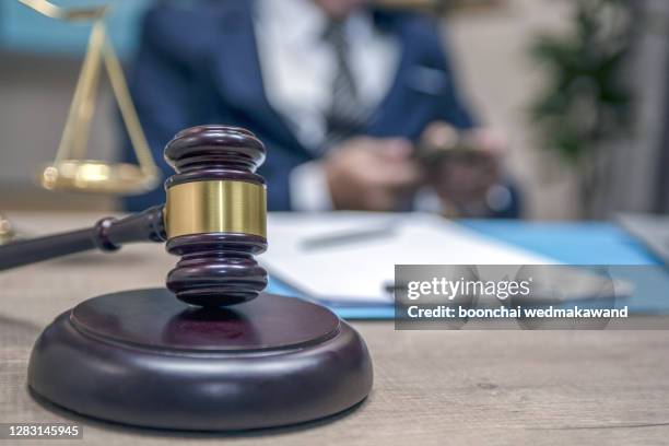 judge gavel with justice lawyers, businessman - property auction stock-fotos und bilder