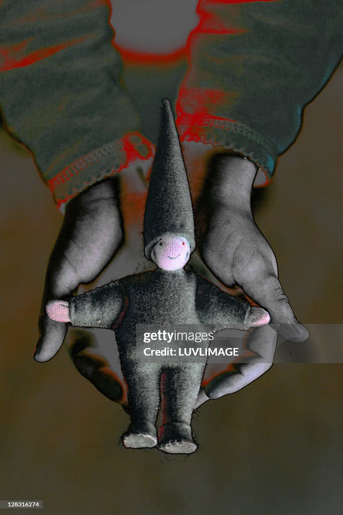 Puppet in hands of child
