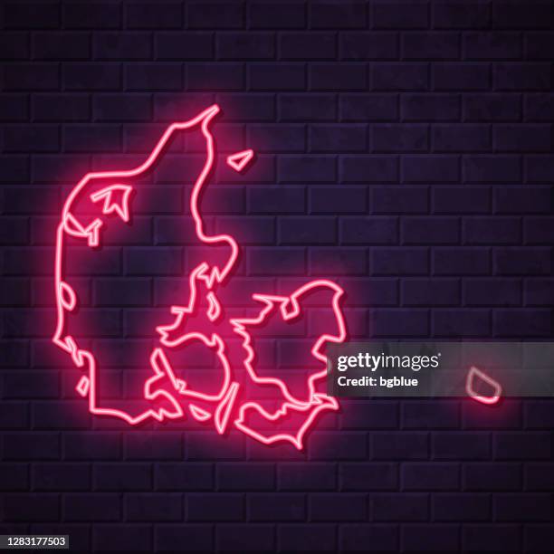 denmark map - glowing neon sign on brick wall background - led light wall stock illustrations