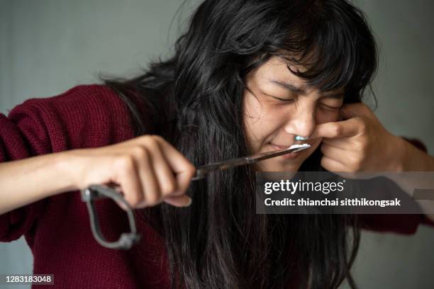 girl doing line of cocaine. - abused girl stock pictures, royalty-free photos & images