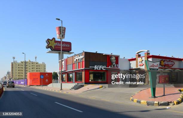 kfc and hardee's, dammam, eastern province, saudi arabia - 2018 yankee logo stock pictures, royalty-free photos & images