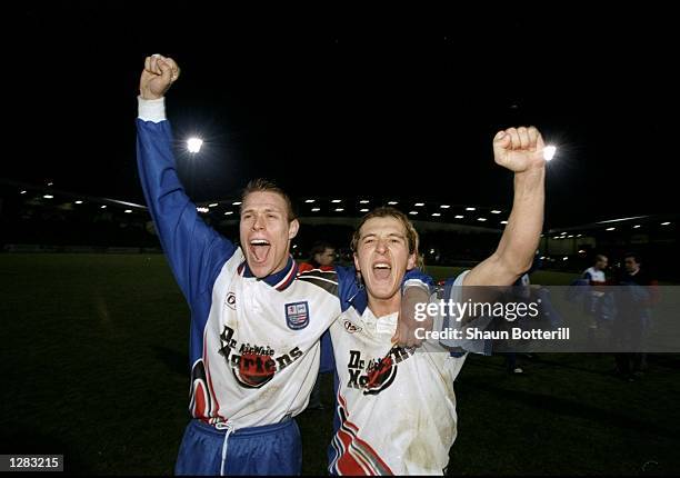 Colin West and Jon Brady of Rushden and Diamonds celebrates winning the FA Cup 2 Replay match against Doncaster at Nene Park, Irthingborough,...