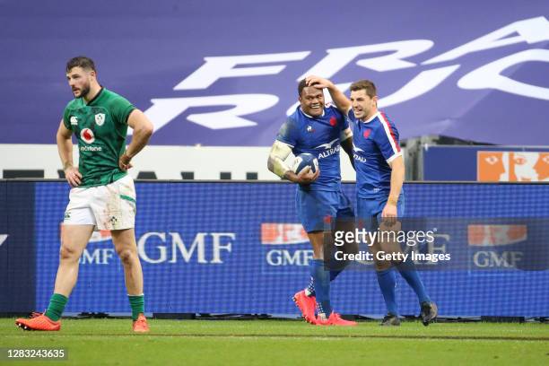 Virimi Vakatawa of France celebrates after scoring a try with Anthony Bouthier of France during the 2020 Guinness Six Nations match between France...