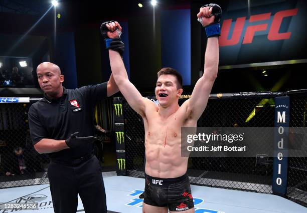 Alexander Hernandez reacts after his knockout victory over Chris Gruetzemacher in a lightweight bout during the UFC Fight Night event at UFC APEX on...