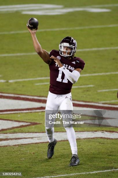 Kellen Mond of the Texas A&M Aggies throws a pass for a touchdown in the first quarter against the Arkansas Razorbacks at Kyle Field on October 31,...