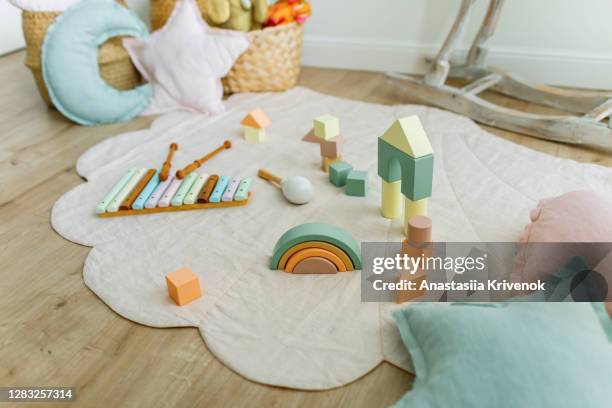 empty children's playroom full of natural wood toys. - quarto do bebé imagens e fotografias de stock