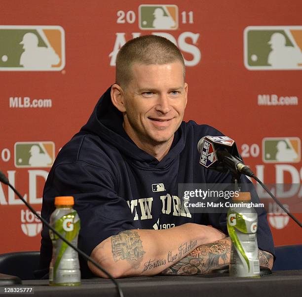 Burnett of the New York Yankees looks on as he speaks to the media during a press conference after Game Four of the American League Division Series...