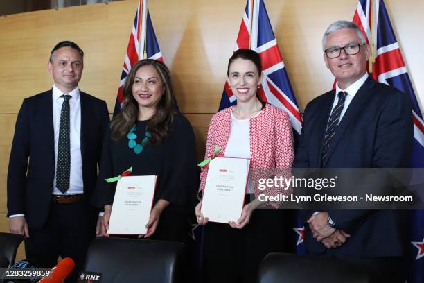 New Zealand Green Party co-leaders James Shaw and Marama Davidson pose for a photo with Labour leader Jacinda Ardern and Labour deputy Leader Kelvin...