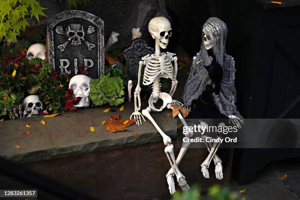 An Upper East Side home is decorated with skeletons for Halloween on October 31, 2020 in New York City. Many Halloween events have been canceled or...