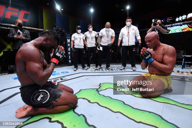 Anderson Silva of Brazil and Uriah Hall of Jamaica pay each other respect after their middleweight bout during the UFC Fight Night event at UFC APEX...